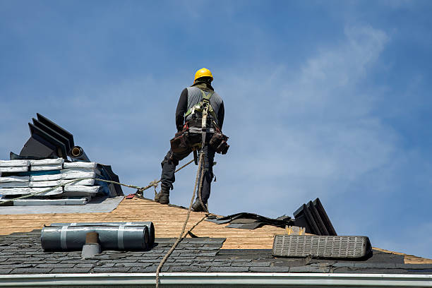 Professional Metal Roofing technician working in Millis, MA